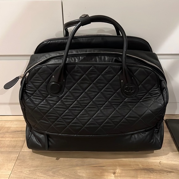 CHANEL Bags Authentic Chanel Rolling Weekender Bag Poshmark